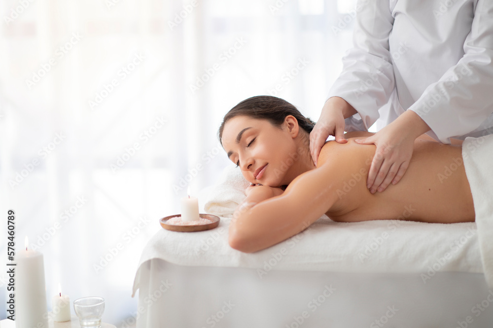 Day At Spa. Indian Woman Having Massage Therapy Session In Wellness Center
