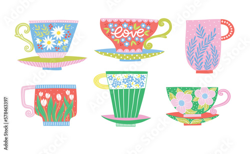Clipart collection of painted tea cups on white background. Tableware decorative pictures in bright colors for design. Hand-drawn trendy vector illustration with mugs and flowers.