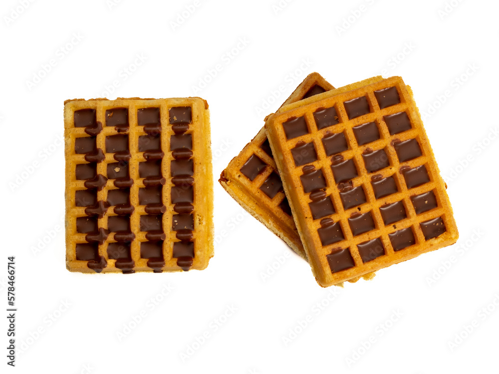Chocolate waffles isolated on white background. Waffles in chocolate. Close-up. Chocolate waffles isolated on white background. Waffles in chocolate. Close-up.