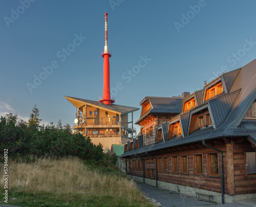 Television transmitter and chalet on Lysa Hora, beskid mountains, Czech republic at summer sunset time. © patrikslezak