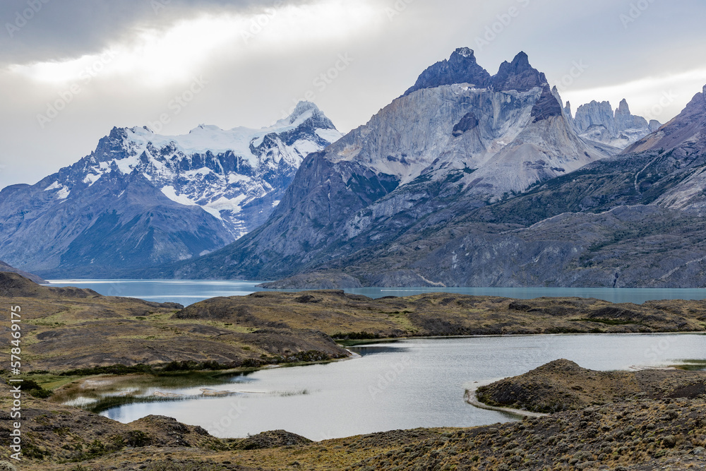 Impressive mountains and a lake with turquoise water at Torres del Paine National Park in Chile, Patagonia, South America Impressive mountains and a lake with turquoise water at Torres del Paine National Park in Chile, Patagonia, South America