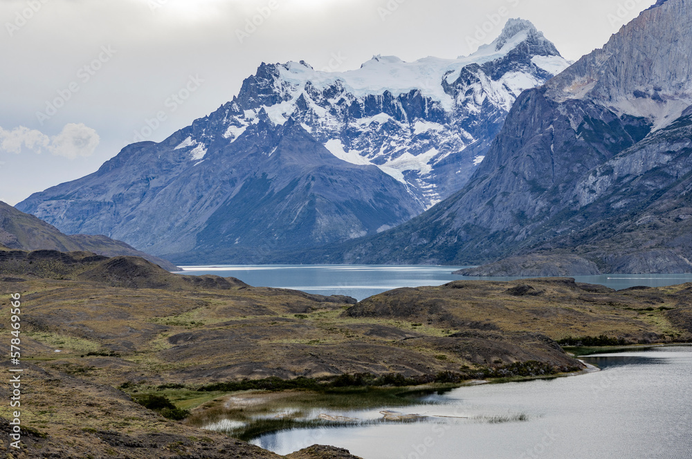Impressive mountains and a lake with turquoise water at Torres del Paine National Park in Chile, Patagonia, South America Impressive mountains and a lake with turquoise water at Torres del Paine National Park in Chile, Patagonia, South America