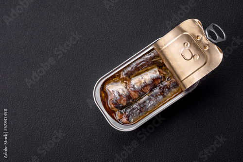 Metal aluminum can of canned sardines in oil with spices and salt