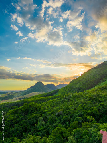 imagem aérea no por do sol da estrada BR101 passando por fazendas e povoados no interior do estado do Espírito Santo, Brasil. photo