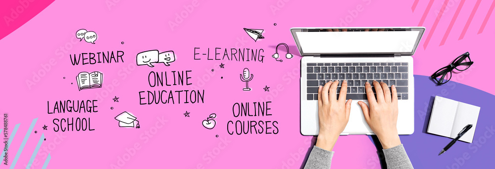 Online education theme with person using a laptop computer - obrazy, fototapety, plakaty 