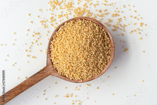 Uncooked Whole Wheat Couscous on a Spoon