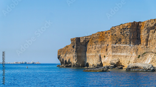 View of the sea and rocks. Blue sea, blue sky and good climate. High image quality. High quality photo