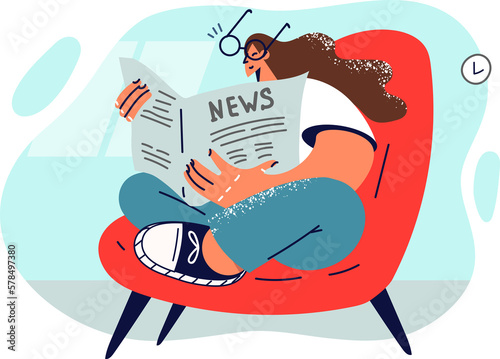 Woman reads newspaper sitting in chair to relax after work or to get latest news from press