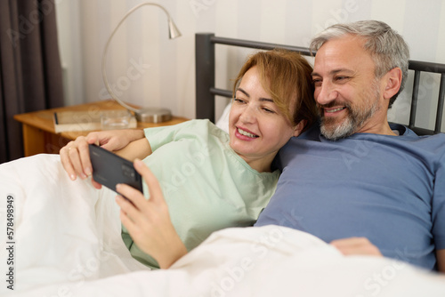 Capturing moments of love with mobile phone at home