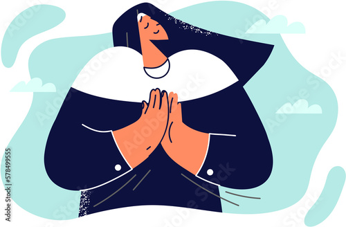 Woman nun of Christian church folded hands in front of chest to turn to God for help and pray