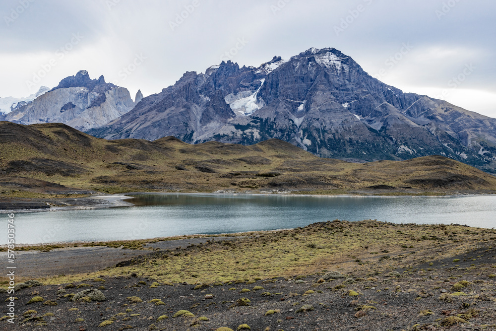 Impressive mountains and a lake with turquoise water at Torres del Paine National Park in Chile, Patagonia, South America