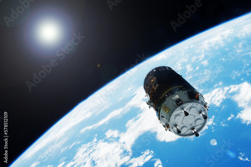 Fototapeta Naklejka Na Ścianę i Meble -  Spaceship over the planet in space. Elements of this image furnishing NASA.