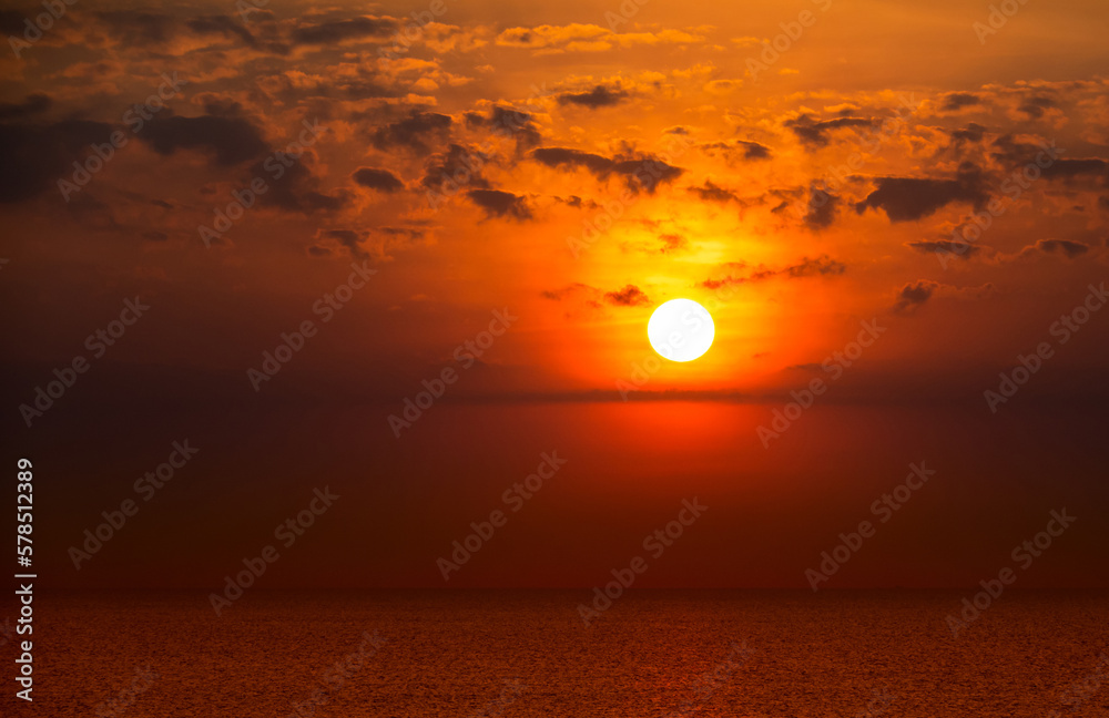 Background of sunset sky concept : Sunset or sunrise with clouds on sea
