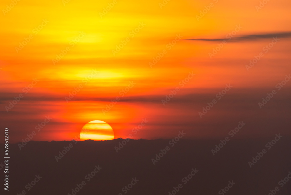 Background of sunset sky concept : Big sun and Mist in sunrise, Morning