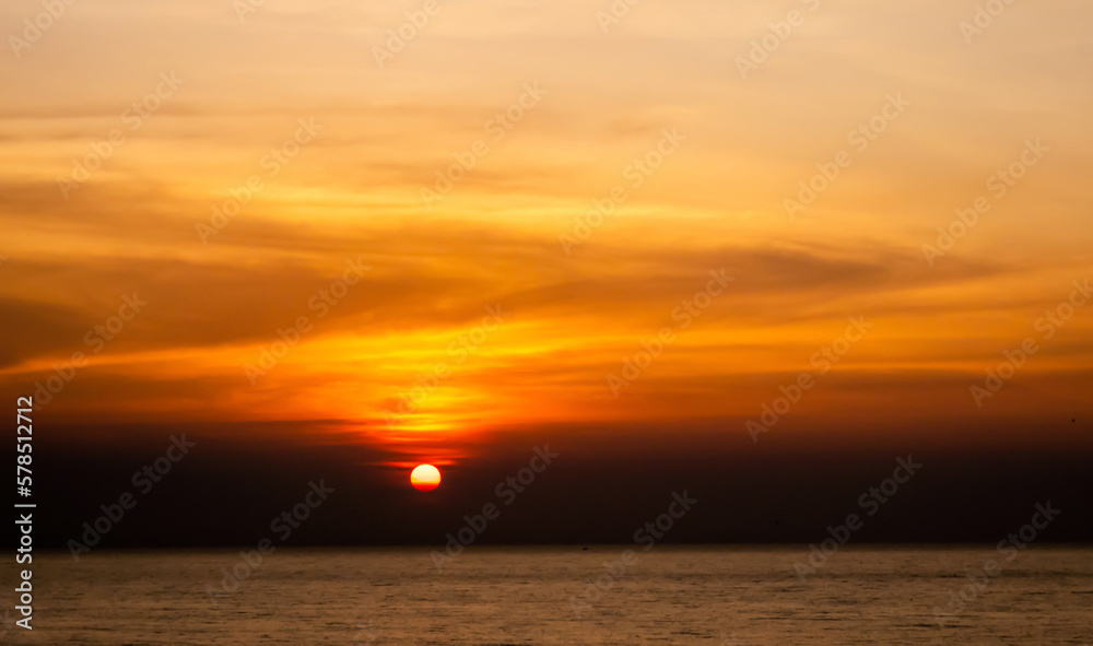 Background of sunset sky concept : sun in sunrise on sea, Morning time