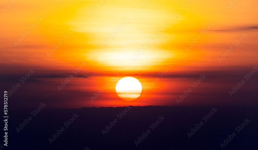 Background of sunset sky concept : Big sun and Mist in sunrise, Morning