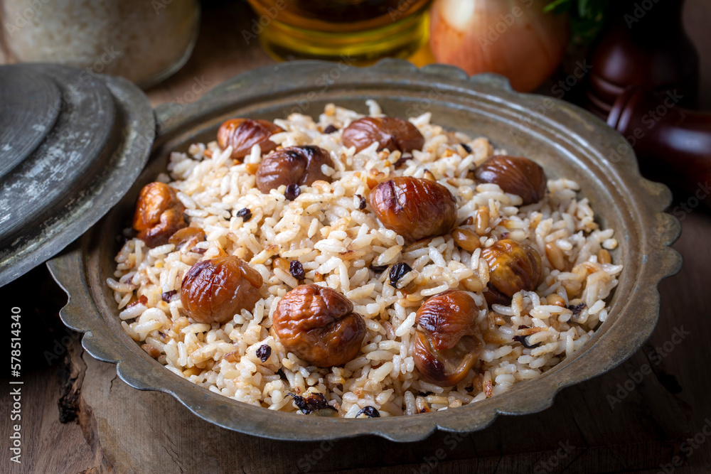 Traditional delicious Turkish food; chestnut rice pilaf (Turkish name; kestaneli pilav) Traditional delicious Turkish food; chestnut rice pilaf (Turkish name; kestaneli pilav)