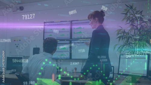 Wallpaper Mural Animation of numbers and financial data processing over diverse man and woman discussing at office Torontodigital.ca