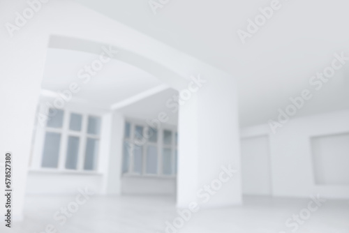 Blurred view of spacious room with windows during repair