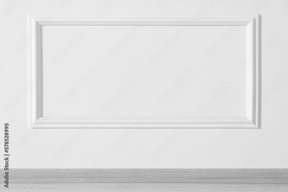 Beautiful white wall with molding in clean empty room Beautiful white wall with molding in clean empty room