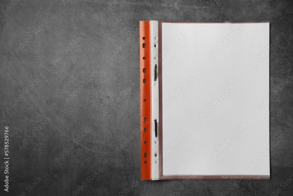 File folder with punched pockets on grey table, top view. Space for text File folder with punched pockets on grey table, top view. Space for text
