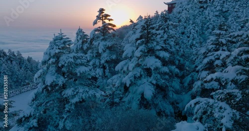 beautiful sunrise snow landscape at the Emei mountain summit at winter day of Sichuan CHina photo