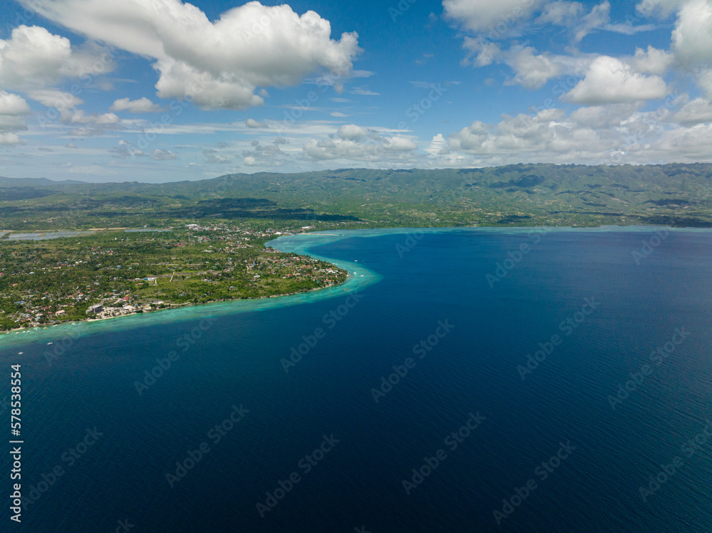 Cebu island with mountains view from the sea. Seascape in the tropics. Philippines.