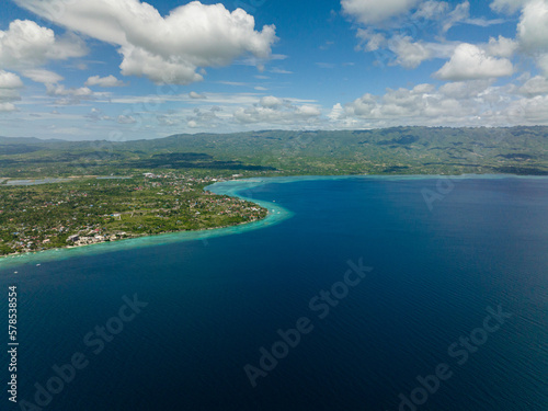 Cebu island with mountains view from the sea. Seascape in the tropics. Philippines.