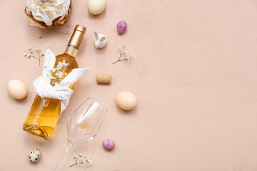 Composition with bottle of wine, glass and Easter eggs on color background