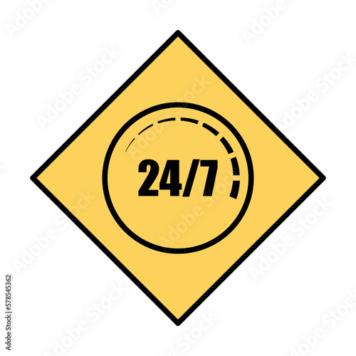 24/7 yellow sign on white b...
