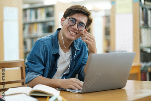 Student studying at library.