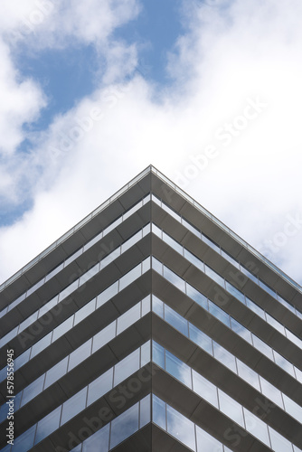 modern geometric office building with sky