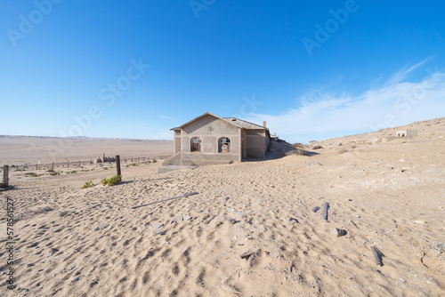 Exterior of Kolmanskop, The abandoned houses. the famous tourist attraction in Namibia, South Africa. Empty sand dune in home room . The ghost town.