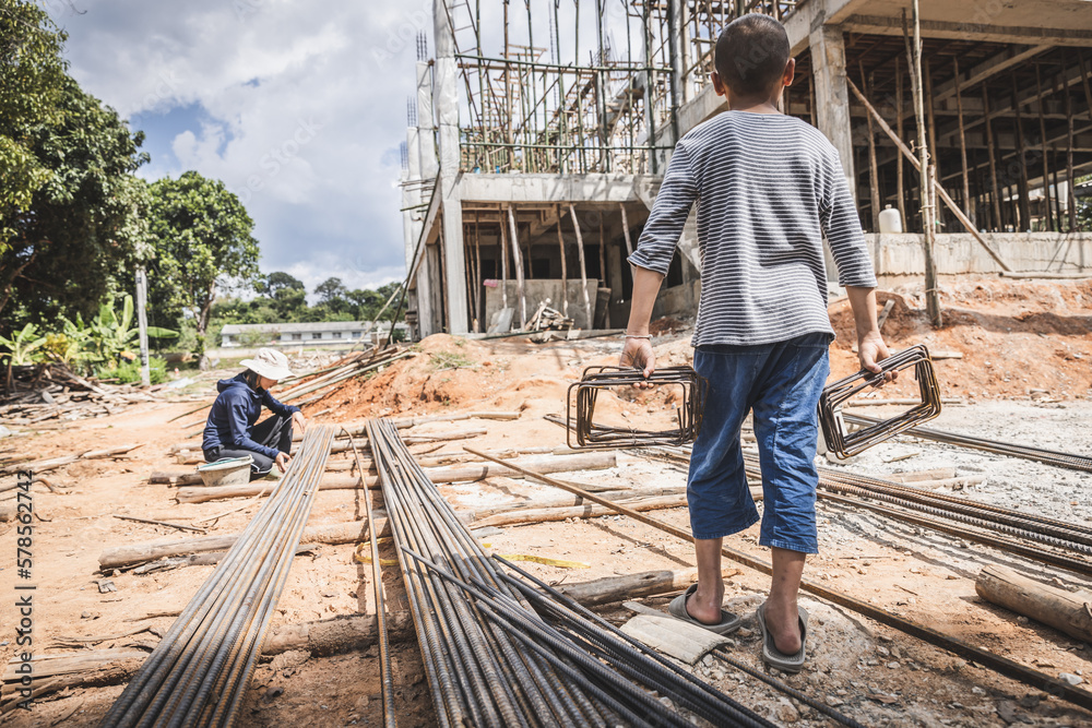 Children are forced to work in construction areas. fear of child labor and human trafficking. Human rights concepts, Stop child abuse. Children are forced to work in construction areas. fear of child labor and human trafficking. Human rights concepts, Stop child abuse.