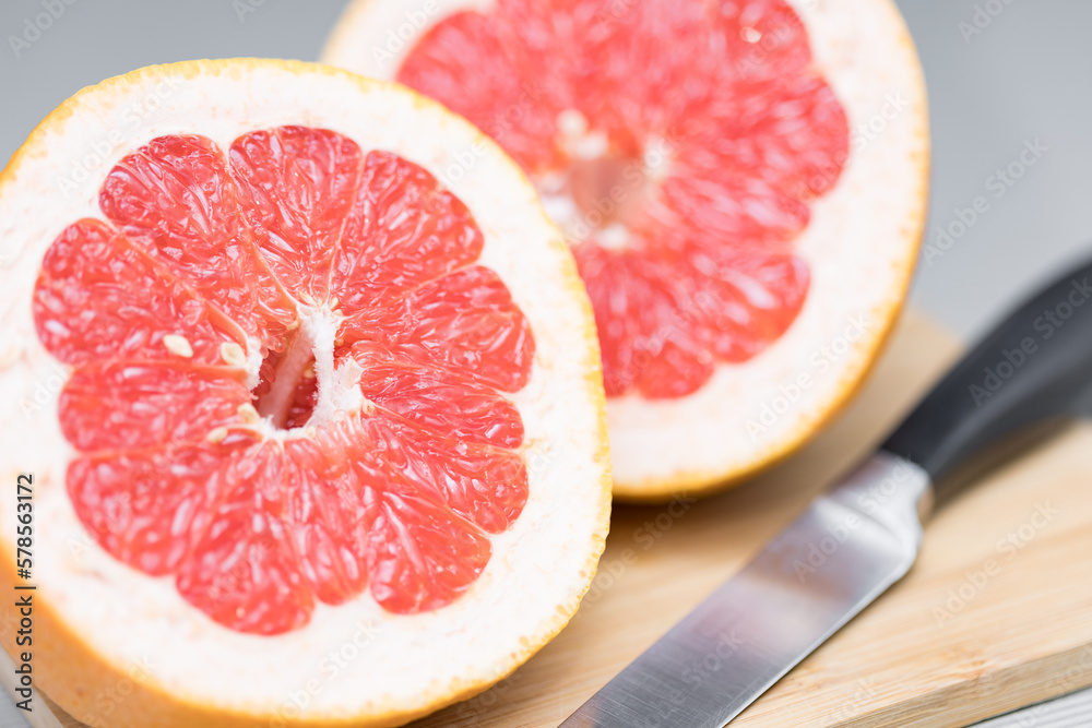 Defocused blurred cut grapefruit macro texture close up Defocused blurred cut grapefruit macro texture close up
