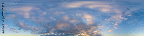 Dark blue sunset sky panorama with Cumulus clouds. Seamless hdr pano in spherical equirectangular format. Complete zenith for 3D visualization, game and sky replacement for aerial drone 360 panoramas.