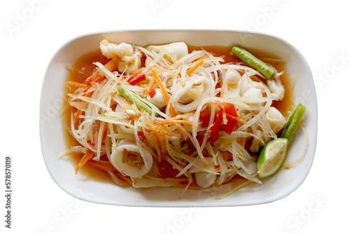 Seafoods papaya salad yummy or somtum is a spicy Thai foods in isolated background. photo