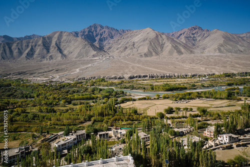 Leh town seen from above with many houses and mountains surrounded at Ladakh, in the Indian Himalayas. © Nhan