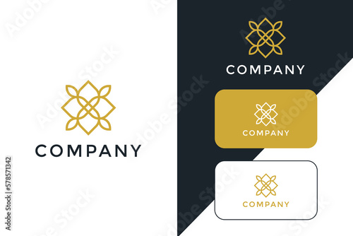 Gold flower logo design line art. Can be used for beauty salons, decorations, boutiques, spas, yoga, cosmetic and skin care products.