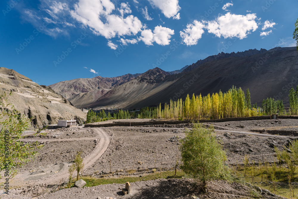 Beautiful landscape with long road and mountain blue sky background view near Ladakh, north India.