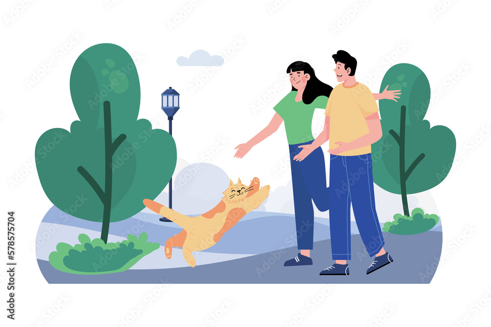 Couple walking with cat in park