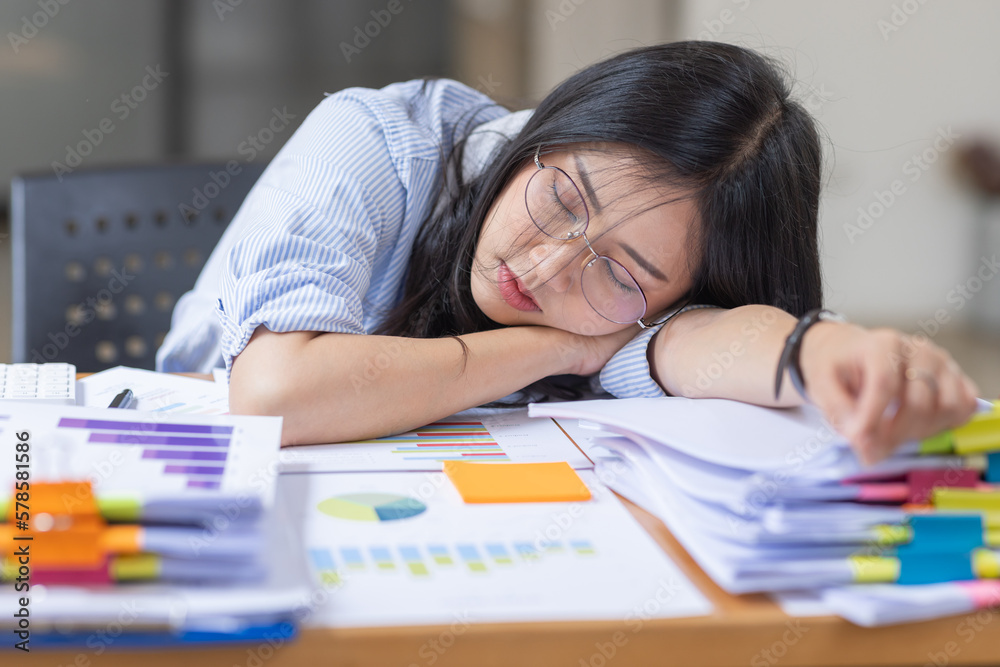 Asian women are stressed while working on laptop, Tired asian businesswoman with headache at office, feeling sick at work, copy space
Asian women are stressed while working on laptop, Tired asian businesswoman with headache at office, feeling sick at work, copy space