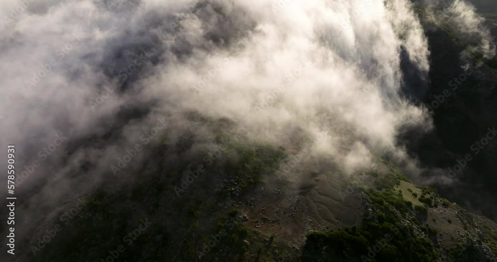 Flight Over Clouds Canopy On Pico do Arieiro Peak In Madeira Island, Portugal. Aerial Drone Shot Flight Over Clouds Canopy On Pico do Arieiro Peak In Madeira Island, Portugal. Aerial Drone Shot