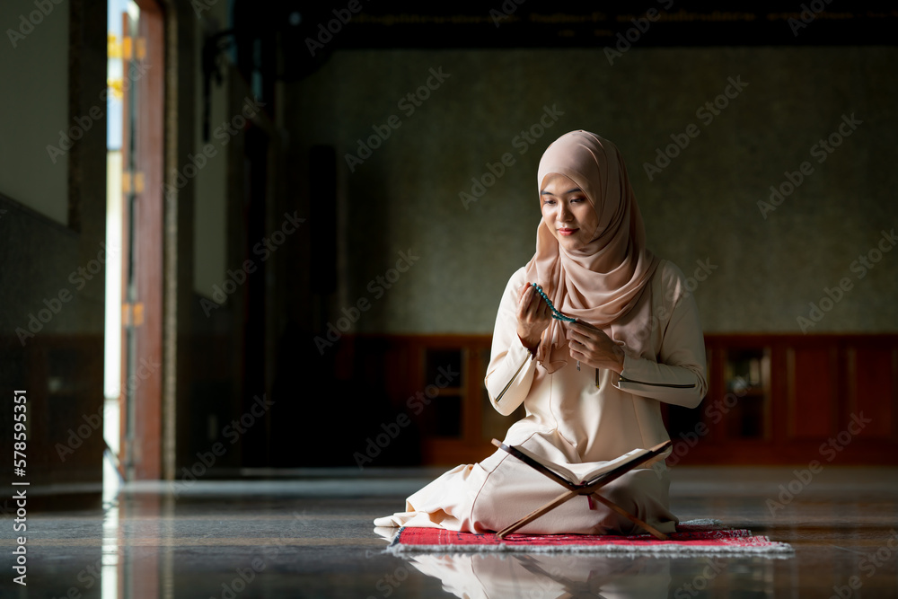The image of an Asian Muslim woman in the Islamic religion in hijab in ...