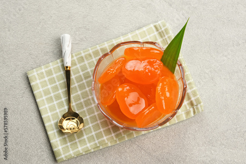 Manisan Kolang-Kaling, or preserved sugar palm fruit with orange color, Indonesian drink and dessert during the month of Ramadan. 
 photo