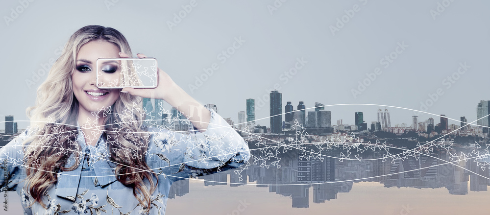 Young woman with smartphone. Happy girl making selfie photo on cell phone and smiling Young woman with smartphone. Happy girl making selfie photo on cell phone and smiling