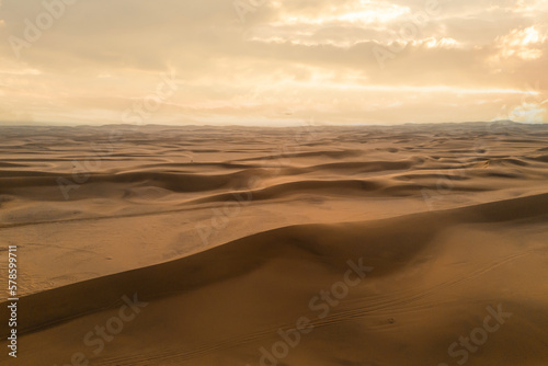 Aerial top view of Namib Desert Safari with sand dune in Namibia, South Africa. Natural landscape background at sunset. Famous tourist attraction. Sand in Grand Canyon