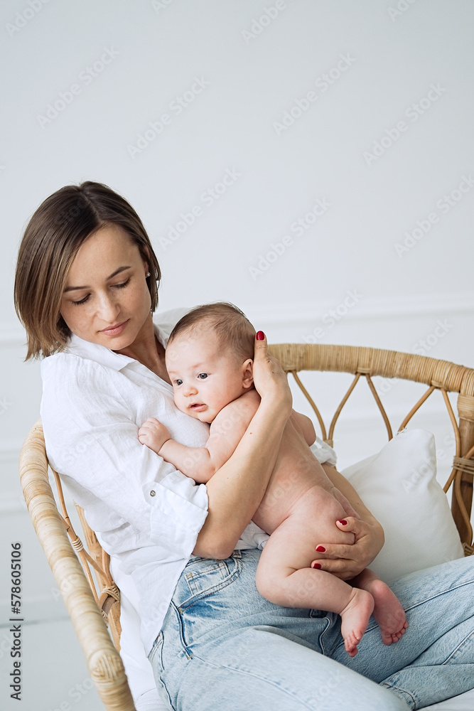 Portrait of a beautiful mother with her 3 month old baby Portrait of a beautiful mother with her 3 month old baby