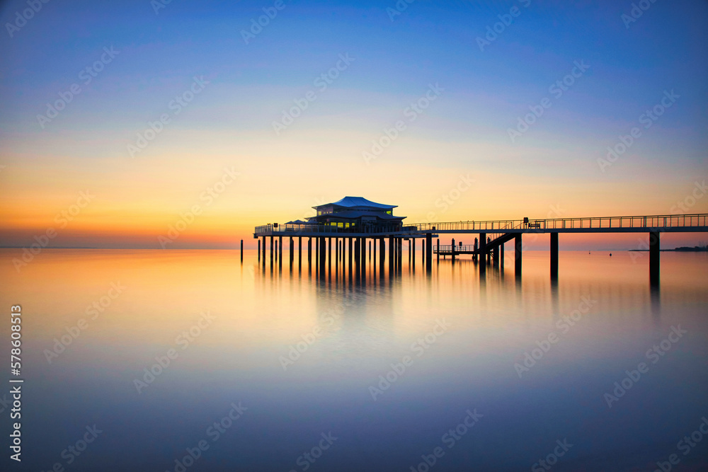 Sunset over the pier in the Gulf of Mexico, Florida.