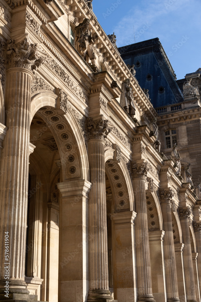 the facade of the louvre museum